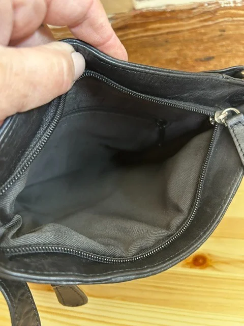 Black leather across body messenger style shoulder bag view 8