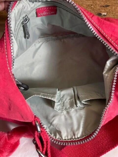 Kipling pink slouch hobo adjustable strap multi pocket shoulder bag Ilse monkey view 4