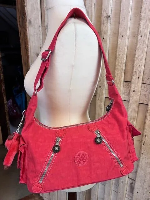 Kipling pink slouch hobo adjustable strap multi pocket shoulder bag Ilse monkey view 2