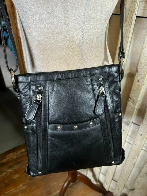 Black leather across body messenger style shoulder bag
